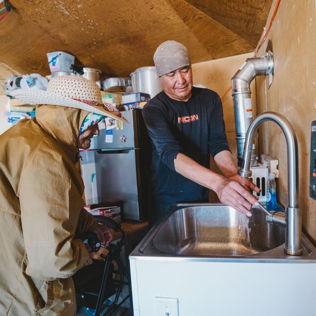 Turning on water into faucet as part of pronounce commitment - Navajo Water Project