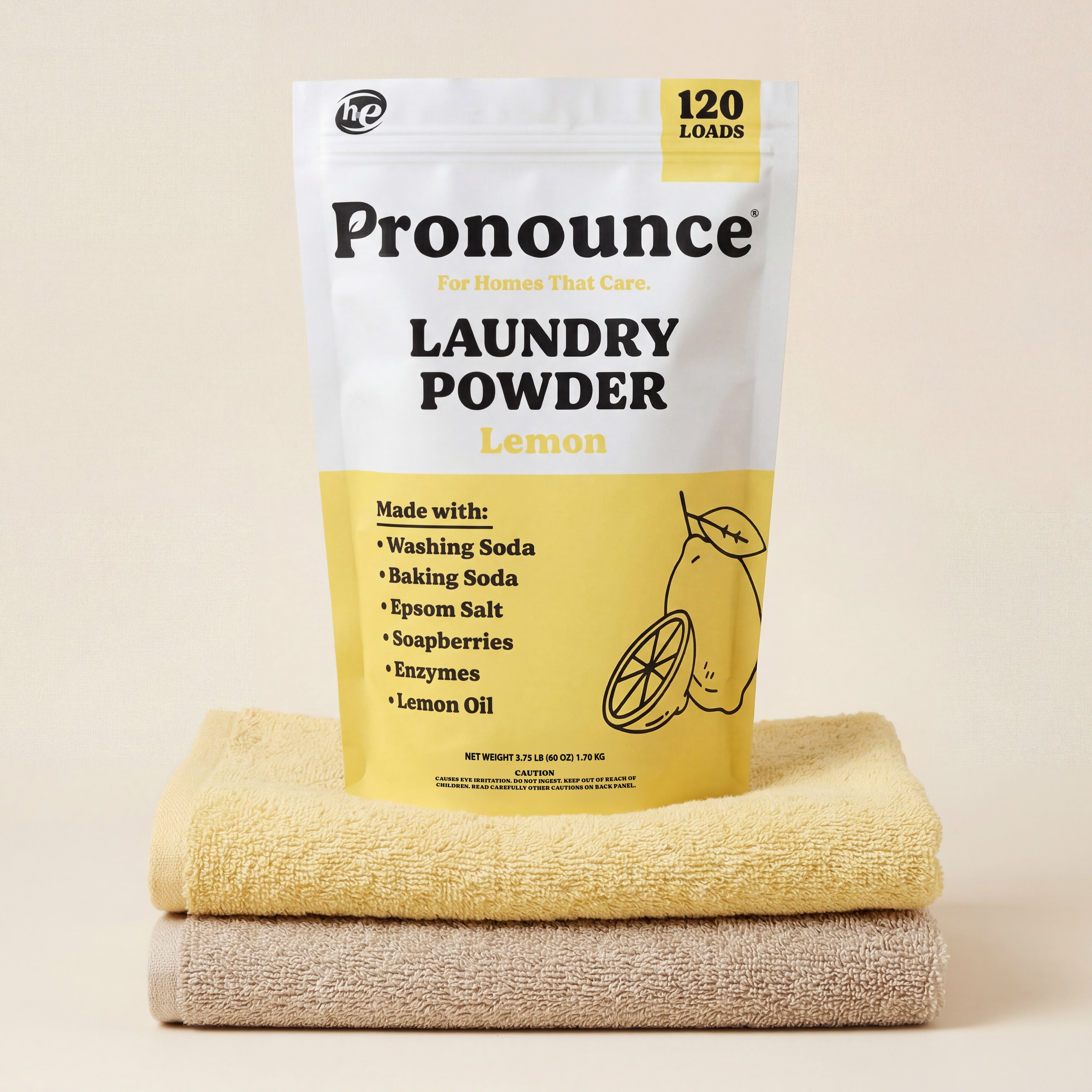 Pronounce lemon laundry powder bag showing 120 loads on folded towels