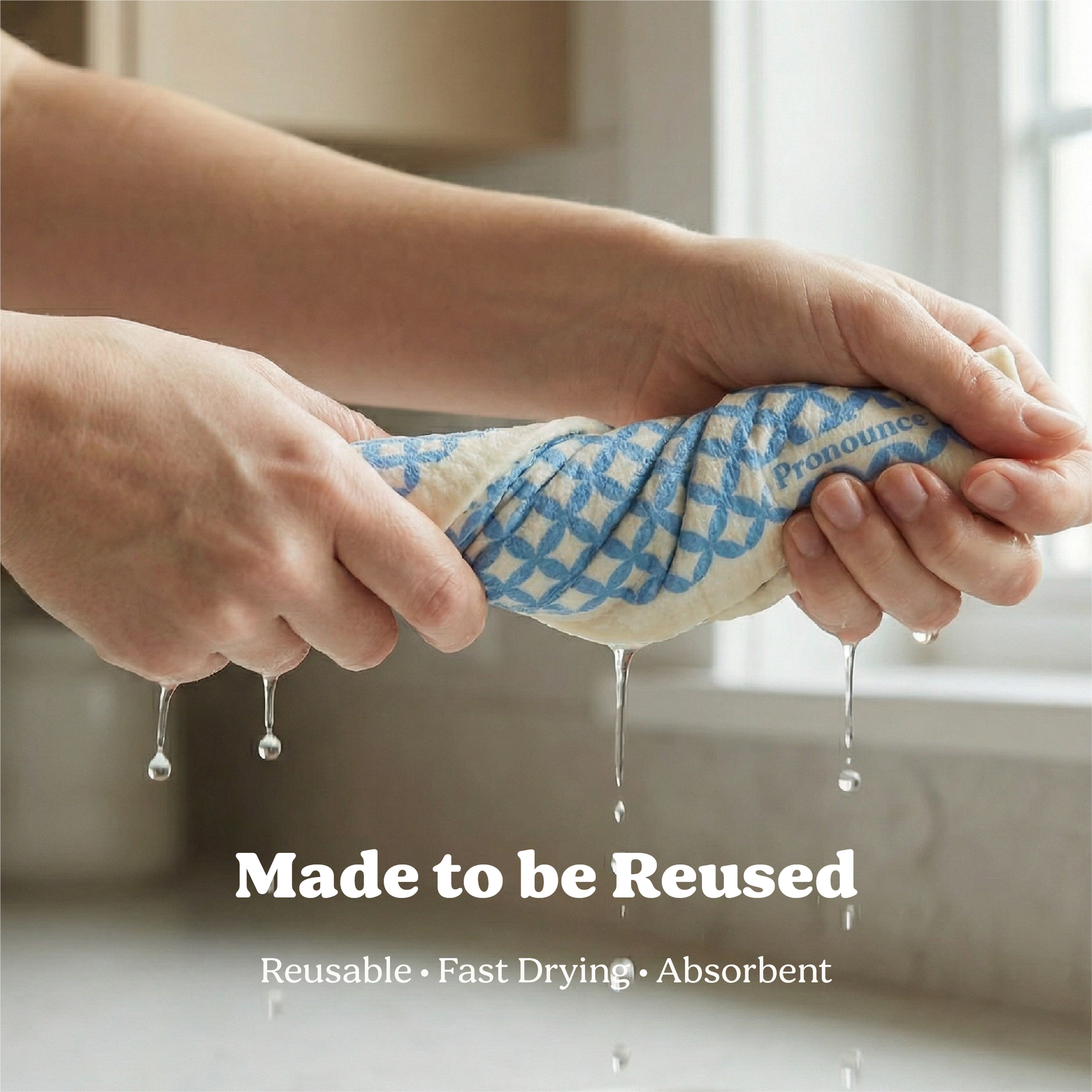 Reusable dish cloth being wrung out showing absorbent and fast-drying material